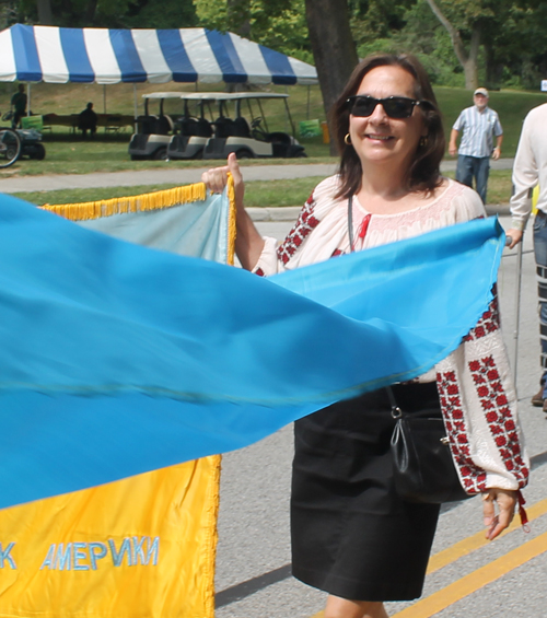 Ukrainian Cultural Garden members marching in the Parade of Flag on One World Day